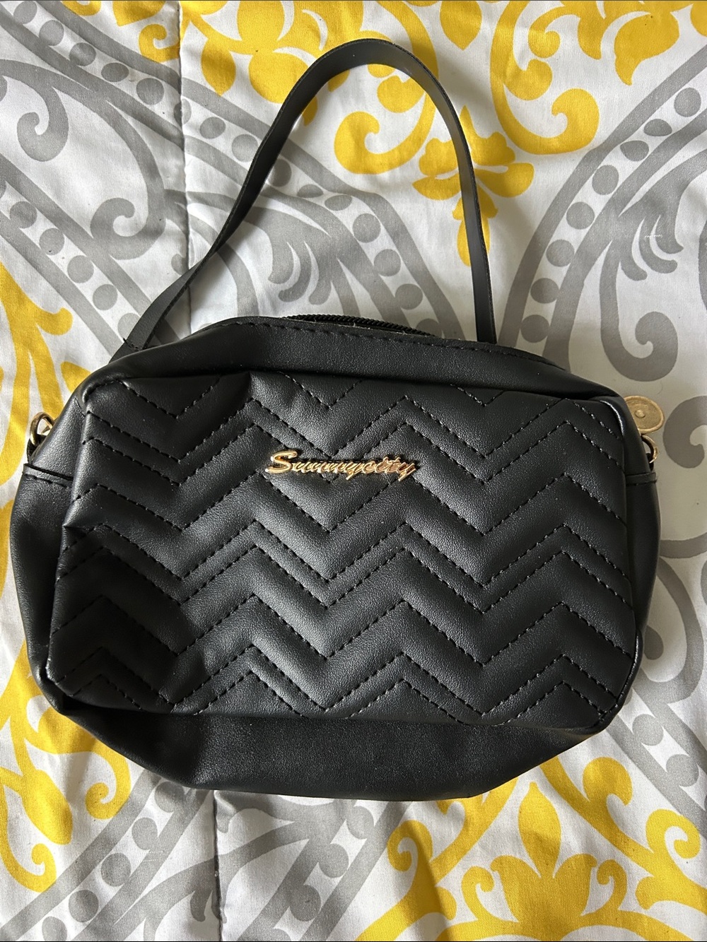 Black Quilted Crossbody Bag with Gold Logo